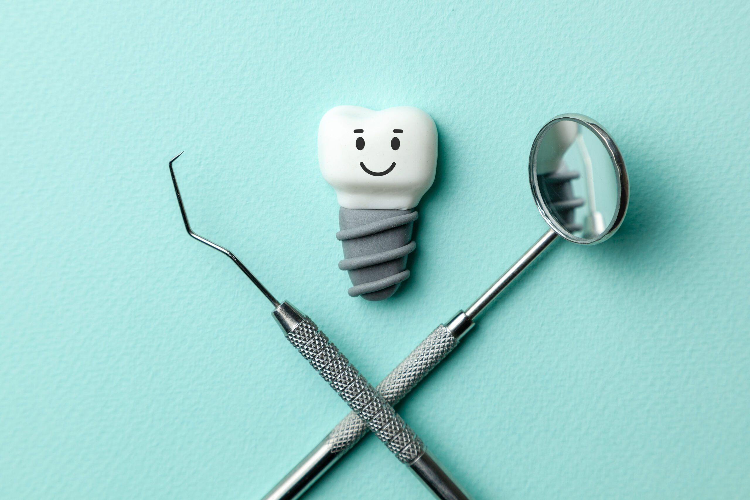 Comparison of single dental implants and bridges as tooth replacement options